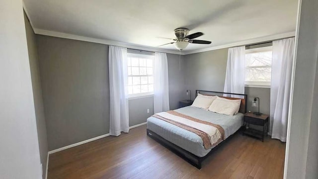 23528 King Dr, Clinton Township, MI 48035 - bedroom with wood finished floors, a ceiling fan, ornamental molding, and baseboards
