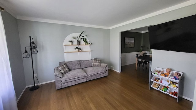 23528 King Dr, Clinton Township, MI 48035 - living area featuring wood finished floors, crown molding, and visible vents