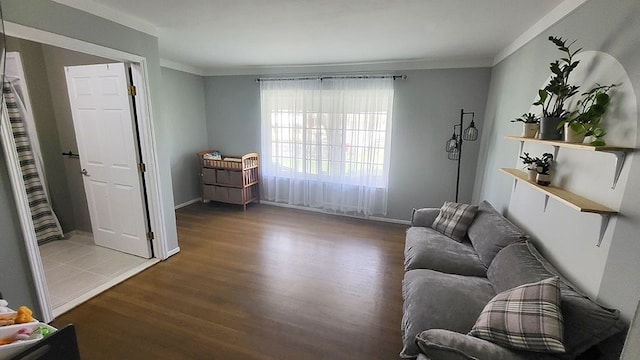23528 King Dr, Clinton Township, MI 48035 - sitting room with wood finished floors, ornamental molding, and baseboards