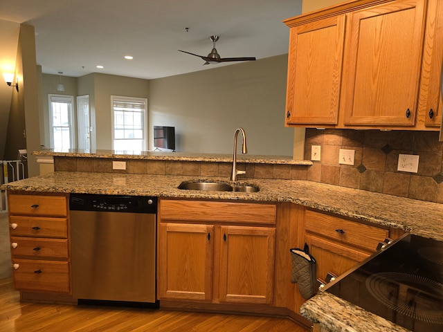 45645 Graystone Ln, Canton, MI 48187 - kitchen with stainless steel dishwasher, a sink, light wood finished floors, decorative backsplash, and recessed lighting