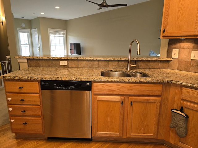 45645 Graystone Ln, Canton, MI 48187 - kitchen featuring stainless steel dishwasher, a sink, light stone countertops, backsplash, and recessed lighting