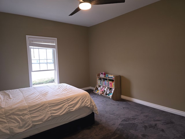 45645 Graystone Ln, Canton, MI 48187 - bedroom with baseboards, dark colored carpet, and a ceiling fan
