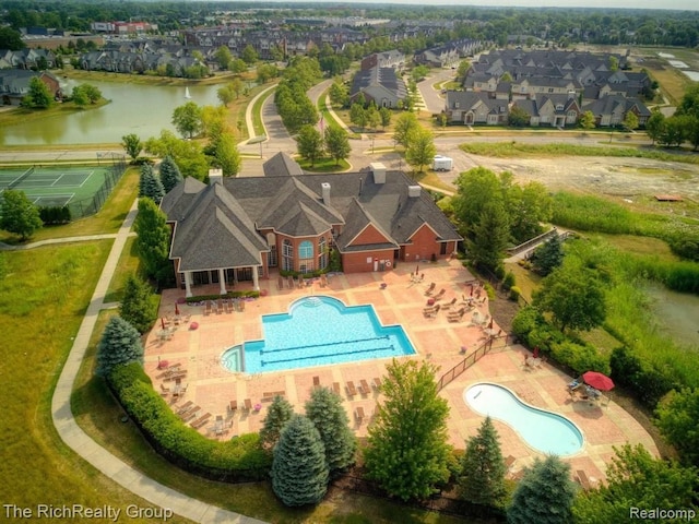 45645 Graystone Ln, Canton, MI 48187 - aerial view of residential area featuring a pool and a large body of water