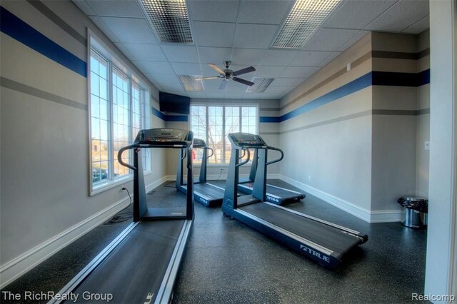 45645 Graystone Ln, Canton, MI 48187 - exercise area featuring baseboards, a paneled ceiling, and a ceiling fan