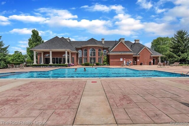 45645 Graystone Ln, Canton, MI 48187 - community pool with a patio area