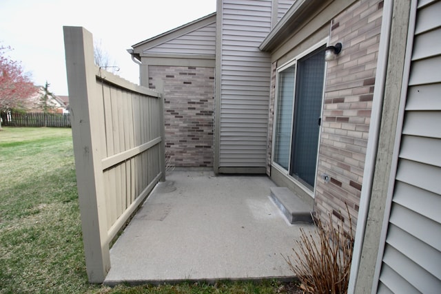 view of patio with fence
