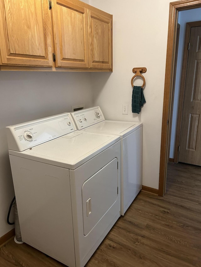 4 Grady Ct, Coldwater, MI 49036 - laundry area with washer and clothes dryer, cabinet space, and dark wood-style floors