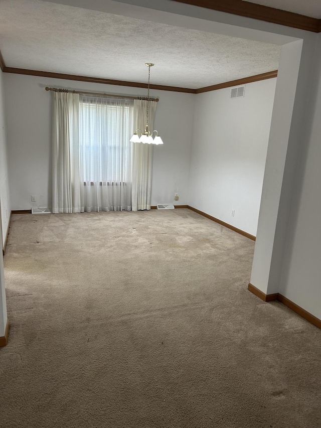 4 Grady Ct, Coldwater, MI 49036 - carpeted spare room featuring ornamental molding, a textured ceiling, and a chandelier