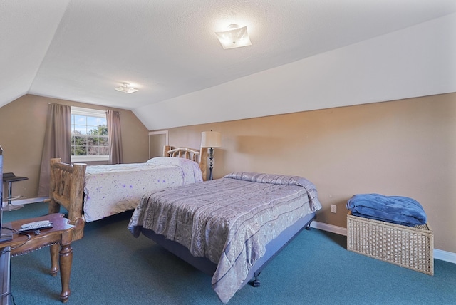 carpeted bedroom with lofted ceiling and baseboards