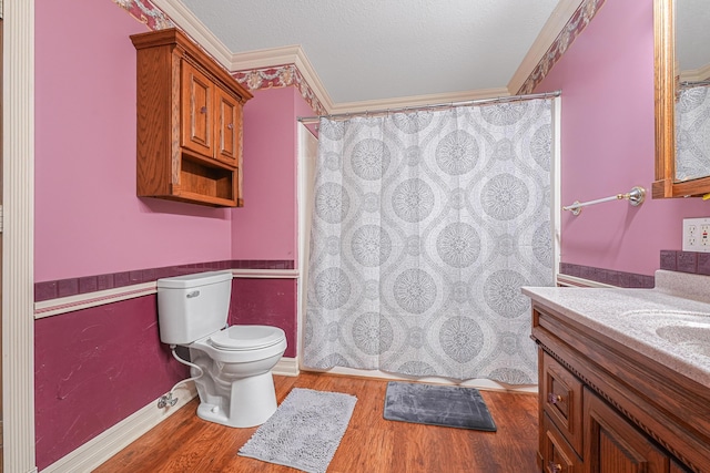 full bath featuring vanity, toilet, ornamental molding, wood finished floors, and a shower with shower curtain