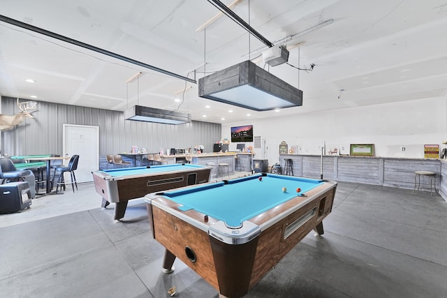 recreation room with billiards and concrete floors