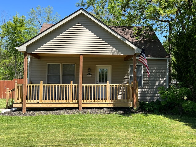 22332 Homestead St, Taylor, MI 48180 - view of front facade featuring a front yard and roof with shingles