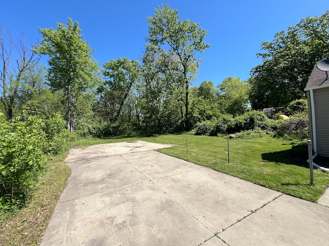 22332 Homestead St, Taylor, MI 48180 - view of grassy yard with a patio