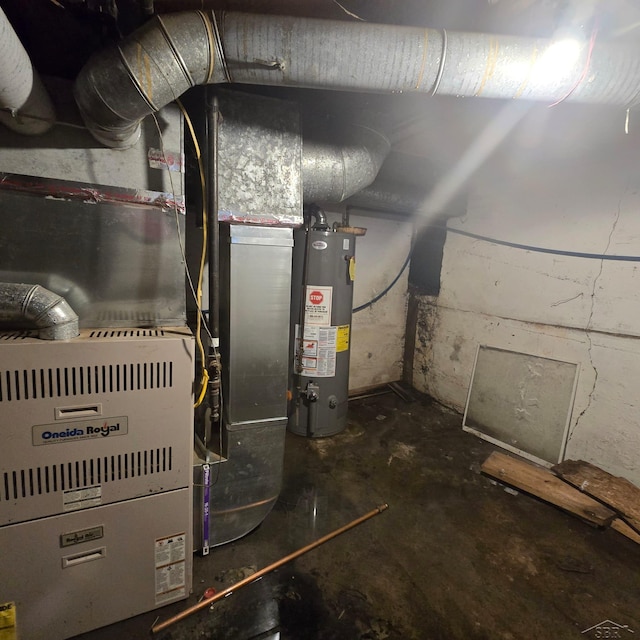 utility room featuring water heater