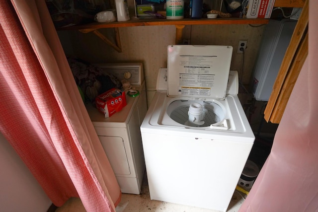 1786 S Camp Ave, White Cloud, MI 49349 - laundry room featuring separate washer and dryer