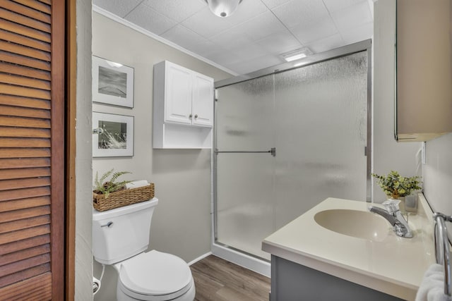 8033 S Portage Rd, Jackson, MI 49201 - full bath with a shower stall, toilet, vanity, and wood finished floors