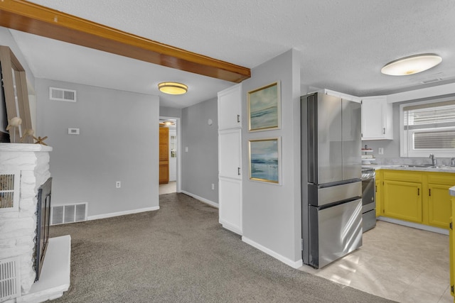 8033 S Portage Rd, Jackson, MI 49201 - kitchen with light countertops, stainless steel appliances, visible vents, and a sink