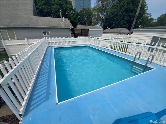 135 Gerald Ave, Clawson, MI 48017 - view of pool with a fenced backyard