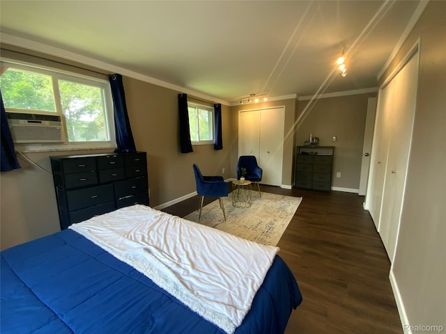 135 Gerald Ave, Clawson, MI 48017 - bedroom featuring baseboards, dark wood finished floors, ornamental molding, a closet, and cooling unit