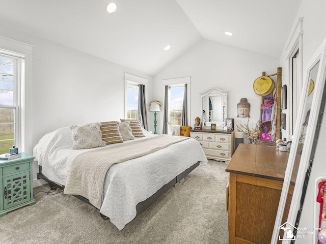 bedroom featuring recessed lighting, lofted ceiling, and light colored carpet