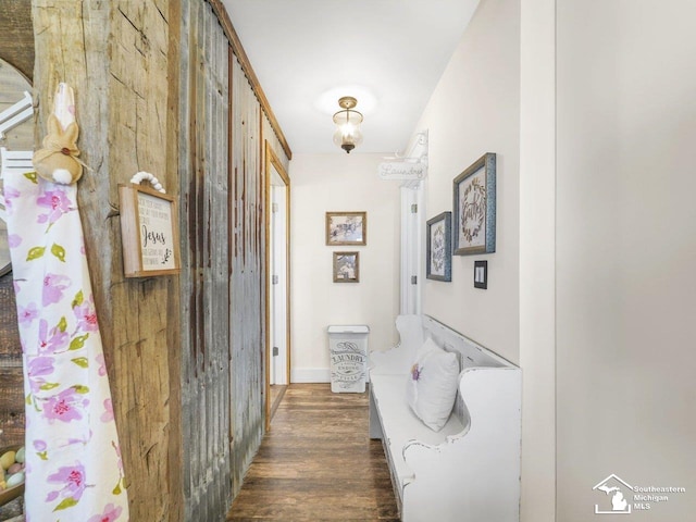 corridor with wood finished floors