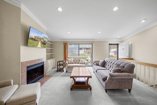living area featuring recessed lighting, a fireplace, built in shelves, carpet, and ornamental molding