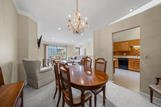 dining area featuring a chandelier, recessed lighting, ornamental molding, and light colored carpet