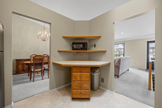 home office with light floors, light colored carpet, baseboards, visible vents, and a notable chandelier