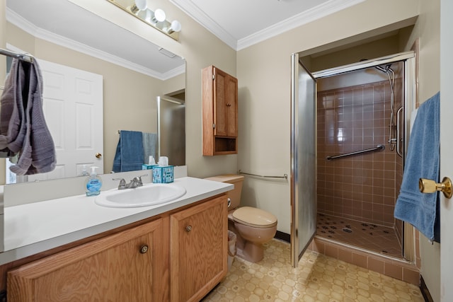 full bathroom featuring ornamental molding, a shower stall, toilet, and vanity