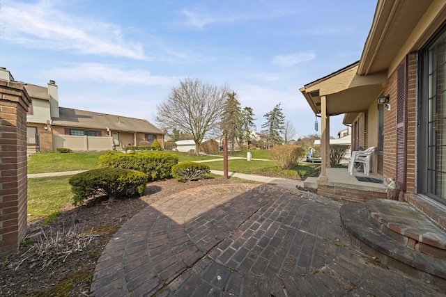 view of patio / terrace featuring a residential view