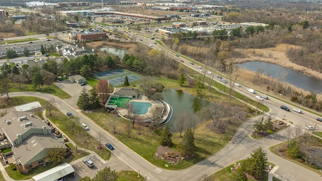 birds eye view of property featuring a water view