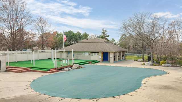 view of pool featuring a patio, a fenced in pool, and a fenced backyard