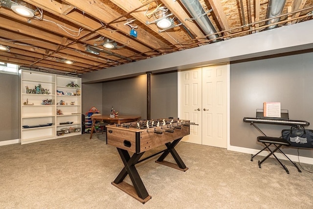 game room featuring carpet floors and baseboards