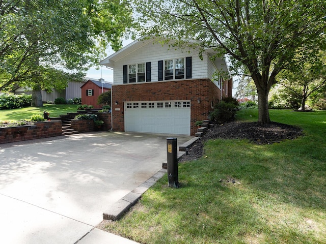 view of front facade featuring concrete driveway, a front lawn, brick siding, and a garage
