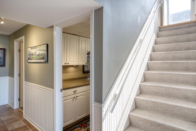 staircase with wainscoting