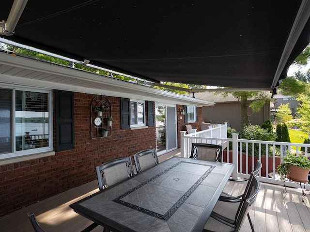 deck featuring outdoor dining area