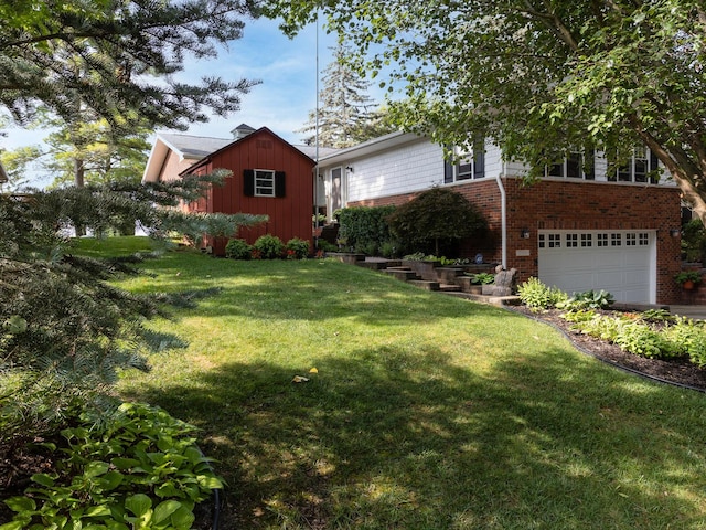 view of front of house with brick siding, an attached garage, and a front yard