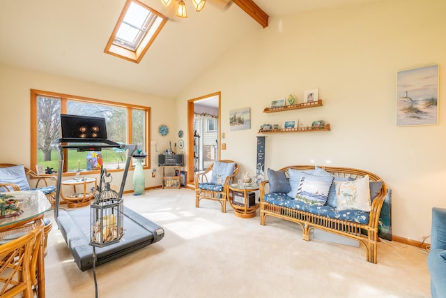 living area featuring carpet flooring, beam ceiling, baseboards, a skylight, and high vaulted ceiling