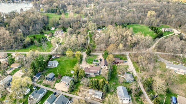 8825 Mills Rd, Manitou Beach, MI 49253 - view of property location featuring a forest and nearby suburban area