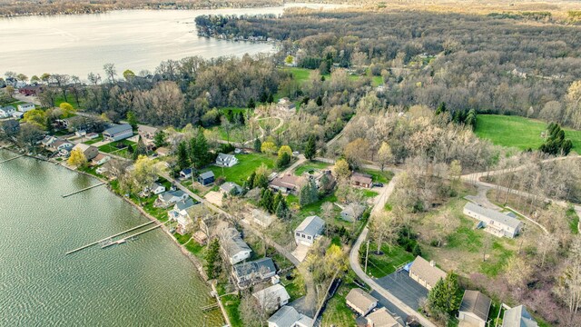8825 Mills Rd, Manitou Beach, MI 49253 - aerial overview of property's location with a large body of water