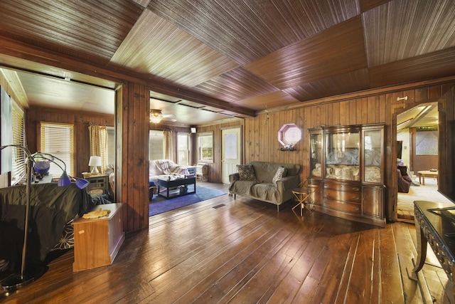 8825 Mills Rd, Manitou Beach, MI 49253 - living room with wooden walls, hardwood / wood-style floors, and wood ceiling