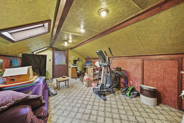 8825 Mills Rd, Manitou Beach, MI 49253 - additional living space with carpet, lofted ceiling, and a skylight