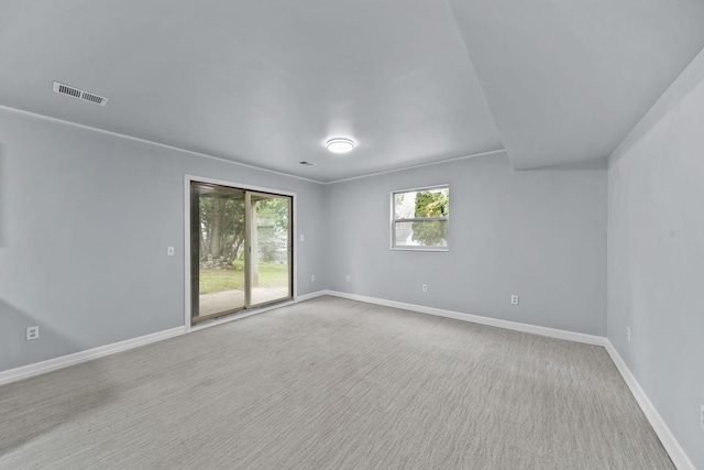 8825 Mills Rd, Manitou Beach, MI 49253 - spare room with baseboards and carpet