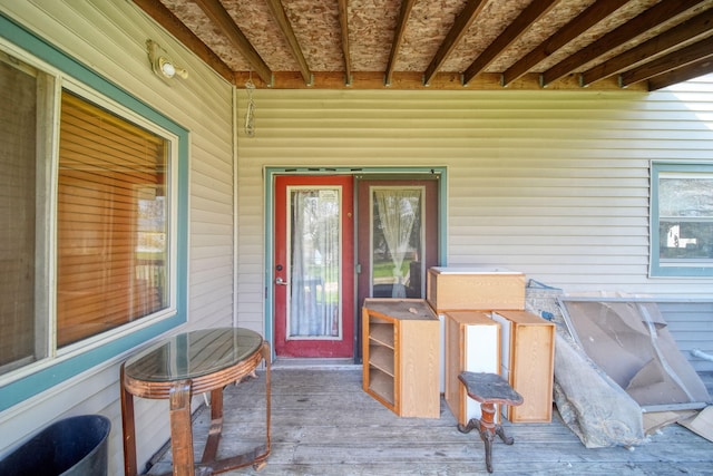 8825 Mills Rd, Manitou Beach, MI 49253 - doorway to property featuring a wooden deck