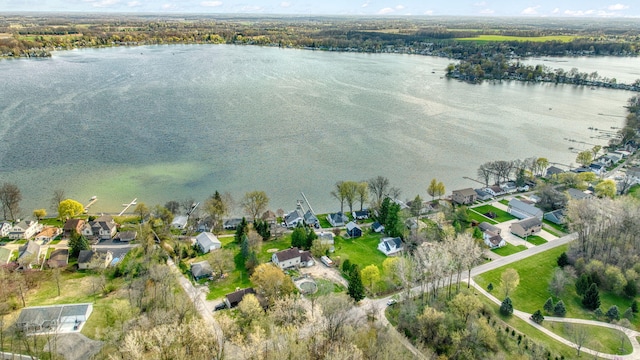 8825 Mills Rd, Manitou Beach, MI 49253 - aerial view of property's location featuring a nearby body of water and nearby suburban area