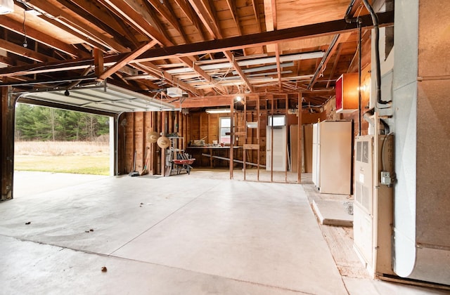 4345 W Mcnally Rd, Coleman, MI 48618 - garage with freestanding refrigerator
