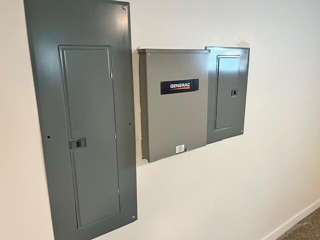 utility room with electric panel