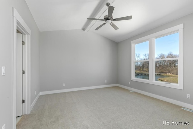 7571 Brook Villa Ct, Allendale, MI 49401 - spare room with light carpet, ceiling fan, and baseboards