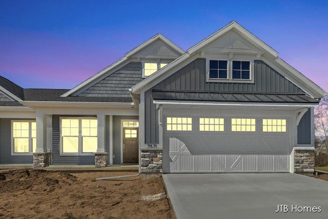 7571 Brook Villa Ct, Allendale, MI 49401 - craftsman house with board and batten siding, stone siding, driveway, and roof with shingles