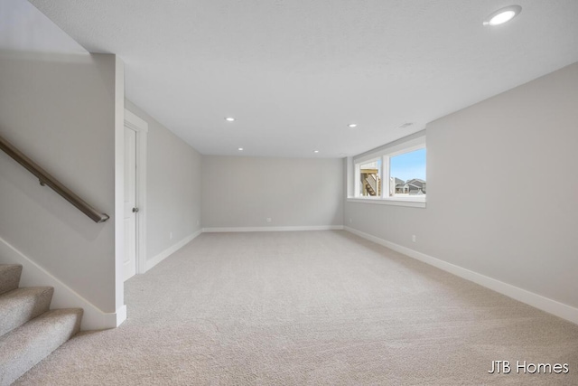 7571 Brook Villa Ct, Allendale, MI 49401 - basement with carpet floors, baseboards, recessed lighting, and stairs
